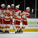 Cup winner is one of NHL's hottest trade targets as Flames receive calls from over 15 teams Apr 7, 2026; Dallas, Texas, USA; Calgary Flames defenseman Yan Kuznetsov (37) and defenseman Zach Whitecloud (28) and center Connor Zary (47) and center Yegor Sharangovich (17) celebrates a goal scored by Sharangovich against the Dallas Stars during the second period at the American Airlines Center. Mandatory Credit: Jerome Miron-Imagn Images