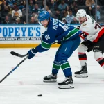 Mar 9, 2026; Vancouver, British Columbia, CAN; Ottawa Senators defenseman Thomas Chabot (72) stick checks Vancouver Canucks forward Elias Pettersson (40) in the second period at Rogers Arena.