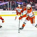 Jan 30, 2025; Calgary, Alberta, CAN; Anaheim Ducks left wing Cutter Gauthier (61) shoots the puck against the Calgary Flames during the first period at Scotiabank Saddledome.