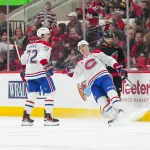 1er janvier 2026 ; Raleigh, Caroline du Nord, États-Unis ; Juraj Slafkovskă (20), ailier gauche des Canadiens de Montréal, célèbre son but avec le défenseur Arber Xhekaj (72) lors de la troisième période contre les Hurricanes de la Caroline au Lenovo Center.