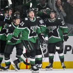 Apr 20, 2026; Dallas, Texas, USA; Dallas Stars defenseman Thomas Harley (55) and defenseman Nils Lundkvist (5) and left wing Jason Robertson (21) and right wing Mikko Rantanen (96) and center Mavrik Bourque (22) celebrates a goal scored by Robertson during the game between the Stars and the Wild in game two of the first round of the 2026 Stanley Cup Playoffs at American Airlines Center. Mandatory Credit: Jerome Miron-Imagn Images