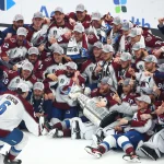 Jun 26, 2022; Tampa, Florida, USA; The Colorado Avalanche pose for a team photo with the Stanley Cup trophy after defeating the Tampa Bay Lightning to win the Stanley Cup in game six of the 2022 Stanley Cup Final at Amalie Arena.