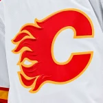 Dec 12, 2022; Montreal, Quebec, CAN; View of a Calgary Flames logo on a jersey worn by the member of the team during the second period at Bell Centre.