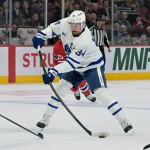 Mar 10, 2026; Montreal, Quebec, CAN; Toronto Maple Leafs forward Auston Matthews (34) shoots the puck against the Montreal Canadiens during the first period at the Bell Centre. :