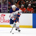 Apr 24, 2026; Anaheim, California, USA; Edmonton Oilers defenseman Evan Bouchard (2) skates with the puck during the third period against the Anaheim Ducks in game three of the first round of the 2026 Stanley Cup Playoffs at Honda Center.