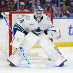 Jan 6, 2026; Buffalo, New York, USA; Vancouver Canucks goaltender Thatcher Demko (35) looks for the puck during the second period against the Buffalo Sabres at KeyBank Center.