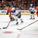 Apr 26, 2026; Anaheim, California, USA; Edmonton Oilers center Trent Frederic (10) skates with puck during the third period against the Anaheim Ducks in game four of the first round of the 2026 Stanley Cup Playoffs at Honda Center.
