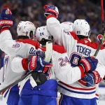 May 18, 2026; Buffalo, New York, USA; Montréal Canadiens center Phillip Danault (24) celebrates his goal with teammates during the first period against the Buffalo Sabres in game seven of the second round of the 2026 Stanley Cup Playoffs at KeyBank Center.