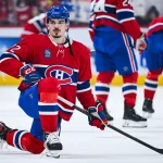 Jan 10, 2026; Montreal, Quebec, CAN; Montreal Canadiens defenseman Arber Xhekaj (72) stretches during warm-up before the game against the Detroit Red Wings at Bell Centre.
