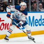 Jan 17, 2026; Vancouver, British Columbia, CAN; Edmonton Oilers forward Connor McDavid (97) handles the puck against the Vancouver Canucks in the third period at Rogers Arena.