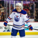 Feb 4, 2026; Calgary, Alberta, CAN; Edmonton Oilers center Connor McDavid (97) against the Calgary Flames during the third period at Scotiabank Saddledome.