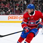 3 décembre 2024; Montréal, Québec, Canada; Patrik Laine (92), ailier droit des Canadiens de Montréal, observe le jeu face aux Islanders de New York durant la troisième période au Centre Bell.