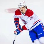 Mar 16, 2024; Calgary, Alberta, CAN; Montreal Canadiens defenseman Arber Xhekaj (72) skates with the puck during the warmup period against the Calgary Flames at Scotiabank Saddledome.