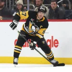 Dec 16, 2025; Pittsburgh, Pennsylvania, USA; Pittsburgh Penguins center Sidney Crosby (87) handles the puck against the Edmonton Oilers during the second period at PPG Paints Arena.