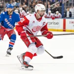 Apr 4, 2026; New York, New York, USA; Detroit Red Wings center Dylan Larkin (71) skates against the New York Rangers during the third period at Madison Square Garden.