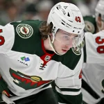 Elliotte Friedman draws a line in the sand on Quinn Hughes contract talks with Wild Apr 9, 2026; Dallas, Texas, USA; Minnesota Wild defenseman Quinn Hughes (43) looks on during the game between the Stars and the Wild at American Airlines Center. Mandatory Credit: Jerome Miron-Imagn Images