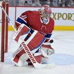 Apr 15, 2022; Montreal, Quebec, CAN; Montreal Canadiens goalie Carey Price (31) makes a save during the third period of the game against the New York Islanders at the Bell Centre.