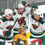 Mar 6, 2026; Las Vegas, Nevada, USA; Minnesota Wild right wing Vladimir Tarasenko (91) celebrates with center Yakov Trenin (13) and defenseman Jared Spurgeon (46) after scoring a goal against the Vegas Golden Knights during the third period at T-Mobile Arena.