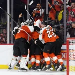 Apr 29, 2026; Philadelphia, Pennsylvania, USA; The Philadelphia Flyers celebrate after game six of the first round of the 2026 Stanley Cup Playoffs against the Pittsburgh Penguins at Xfinity Mobile Arena.
