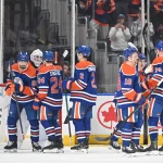 Mar 17, 2026; Edmonton, Alberta, CAN; Edmonton Oilers goalie Connor Ingram (39) along with defenseman Jake Walman (96) and defenseman Spencer Stastney (24) celebrate their win over the San Jose Sharks during the third period at Rogers Place. :