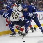 Brad Marchand takes a shot at William Nylander over offseason workout post May 5, 2025; Toronto, Ontario, CAN; Florida Panthers forward Brad Marchand (63) is knocked over by Toronto Maple Leafs defenseman Chris Tanev (8) during the second period of the second round of the 2025 Stanley Cup Playoffs at Scotiabank Arena. Mandatory Credit: John E. Sokolowski-Imagn Images