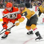 May 6, 2026; Las Vegas, Nevada, USA; Vegas Golden Knights defenseman Kaedan Korczak (6) attempts to tip the puck away from Anaheim Ducks left wing Cutter Gauthier (61) during the second period of game two of the second round of the 2026 Stanley Cup Playoffs at T-Mobile Arena.