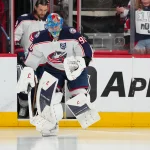Apr 2, 2026; Raleigh, North Carolina, USA; Columbus Blue Jackets goaltender Elvis Merzlikins (90) skates out onto the ice for the warmups before the game against the Carolina Hurricanes at Lenovo Center.