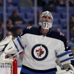 Mar 30, 2022; Buffalo, New York, USA; Winnipeg Jets goaltender Connor Hellebuyck (37) during a stoppage in play in the second period against the Buffalo Sabres at KeyBank Center.
