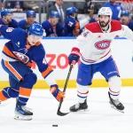 More than 80,000 designs later, fans choose NHL's first fan-designed jersey to be worn next season Apr 12, 2026; Elmont, New York, USA; New York Islanders defenseman Matthew Schaefer (48) keeps the puck away from Montréal Canadiens center Phillip Danault (24) in the first period at UBS Arena. Mandatory Credit: Alexander Wohl-Imagn Images