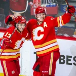 Darryl Sutter gets candid about Johnny Gaudreau and Matthew Tkachuk leaving Calgary May 18, 2022; Calgary, Alberta, CAN; Calgary Flames left wing Matthew Tkachuk (19) celebrates his goal with left wing Johnny Gaudreau (13) during the third period against the Edmonton Oilers in game one of the second round of the 2022 Stanley Cup Playoffs at Scotiabank Saddledome. Mandatory Credit: Sergei Belski-USA TODAY Sports