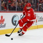 Apr 7, 2026; Detroit, Michigan, USA; Detroit Red Wings center Dylan Larkin (71) skates with the puck in the first period against the Columbus Blue Jackets at Little Caesars Arena.