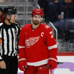 Nov 20, 2025; Detroit, Michigan, USA; Detroit Red Wings center Dylan Larkin (71) reacts in the second period against the New York Islanders at Little Caesars Arena.