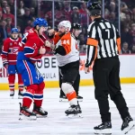 Nov 4, 2025; Montreal, Quebec, CAN; Philadelphia Flyers left wing Nicolas Deslauriers (44) fights against Montreal Canadiens defenseman Arber Xhekaj (72) during the third period at Bell Centre.
