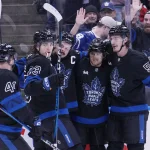 Maple Leafs reportedly place veteran defenceman on trade block with three teams linked Dec 2, 2024; Toronto, Ontario, CAN; Toronto Maple Leafs forward Matthew Knies (23), defenseman Morgan Rielly (44), forward William Nylander (88), and defenseman Philippe Myers (51) celebrate a goal by forward Auston Matthews (34) against the Chicago Blackhawks during the first period at Scotiabank Arena. Mandatory Credit: John E. Sokolowski-Imagn Images