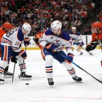 Apr 24, 2026; Anaheim, California, USA; Edmonton Oilers right wing Vasily Podkolzin (92) passes the puck to left wing Zach Hyman (18) during the first period against the Anaheim Ducks in game three of the first round of the 2026 Stanley Cup Playoffs at Honda Center.