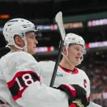 Feb 3, 2026; Raleigh, North Carolina, USA; Ottawa Senators center Tim Stützle (18) celebrates his goal with left wing Brady Tkachuk (7) against the Carolina Hurricanes during the second period at Lenovo Center. Mandatory Credit: James Guillory-Imagn Images