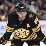 Mar 28, 2026; Boston, Massachusetts, USA; Boston Bruins right wing David Pastrnak (88) gets set for a face-off during the third period against the Minnesota Wild at TD Garden.: