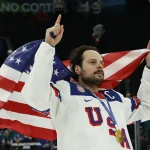 Feb 22, 2026; Milan, Italy; Auston Matthews #34 of Team United States celebrates after the game against Team Canada during the Milano Cortina 2026 Olympic Winter Games at Milano Santagiulia Ice Hockey Arena.