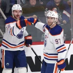 Unexpected free agent spotted working out with McDavid and Hyman has Oilers fans buzzing Jan 8, 2026; Winnipeg, Manitoba, CAN; Edmonton Oilers left wing Zach Hyman (18) celebrates a goal against the Winnipeg Jets with Edmonton Oilers center Connor McDavid (97) in the third period at Canada Life Centre. Mandatory Credit: James Carey Lauder-Imagn Images