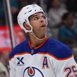 Apr 8, 2026; San Jose, California, USA; Edmonton Oilers defenseman Darnell Nurse (25) looks up at the scoreboard during a break in the action against the San Jose Sharks during the second period at SAP Center at San Jose. Mandatory Credit: David Gonzales-Imagn Images