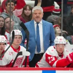 Feb 28, 2026; Raleigh, North Carolina, USA; Detroit Red Wings head coach Todd McLellan looks on against the Carolina Hurricanes during the third period at Lenovo Center.