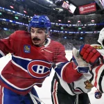 Dec 18, 2025; Montreal, Quebec, CAN; Montreal Canadiens defenseman Arber Xhekaj (72) checks Chicago Blackhawks forward Ryan Greene (20) during the second period at the Bell Centre.