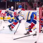 22 janvier 2026; Montréal, Québec, Canada; Le gardien des Canadiens de Montréal, Sam Montembeault (35), arrête un tir de l'attaquant des Sabres de Buffalo, Jack Quinn (22), en deuxième période au Centre Bell.