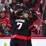 Nov 25, 2024; Ottawa, Ontario, CAN; Ottawa Senators left wing Brady Tkachuk (7) celebrates his goal against the Calgary Flames with Ottawa Senators center Tim Stutzle (18) during the third period at Canadian Tire Centre.