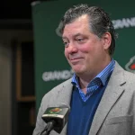 Dec 13, 2025; Saint Paul, Minnesota, USA; Minnesota Wild general manger Bill Guerin addresses the media about acquiring defensemen Quinn Hughes via trade from the Vancouver Canucks before a game against the Ottawa Senators at Grand Casino Arena. Mandatory Credit: Nick Wosika-Imagn Images