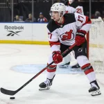 Mar 31, 2026; New York, New York, USA; New Jersey Devils defenseman Simon Nemec (17) controls the puck in the second period against the New York Rangers at Madison Square Garden.