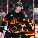 Apr 7, 2026; Vancouver, British Columbia, CAN; Vancouver Canucks forward Elias Pettersson (40) handles the puck in warm up prior to a game against the Vegas Golden Knights at Rogers Arena. Mandatory Credit: Bob Frid-Imagn Images