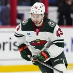 May 3, 2026; Denver, Colorado, USA; Minnesota Wild defenseman Quinn Hughes (43) warms up before game one against the Colorado Avalanche of the second round of the 2026 Stanley Cup Playoffs at Ball Arena. Mandatory Credit: Ron Chenoy-Imagn Images