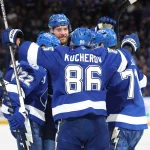 Apr 9, 2025; Tampa, Florida, USA;Tampa Bay Lightning defenseman Victor Hedman (77) is congratulated by right wing Oliver Bjorkstrand (22), right wing Nikita Kucherov (86) and center Anthony Cirelli (71) after he scored a goal against the Toronto Maple Leafs during the third period at Amalie Arena.