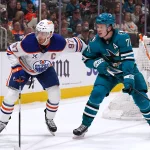 Apr 8, 2026; San Jose, California, USA; Edmonton Oilers center Connor McDavid (97) and San Jose Sharks center Macklin Celebrini (71) wait for the puck during the second period at SAP Center at San Jose. :